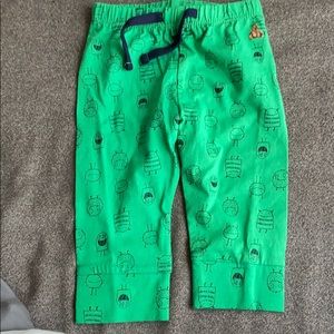Green pants with little monsters